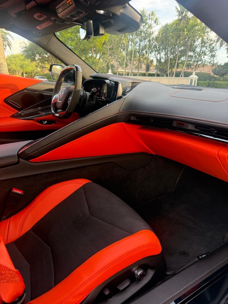 Orange leather interior of an exotic convertible, luxury car rental in Miami & Fort Lauderdale
