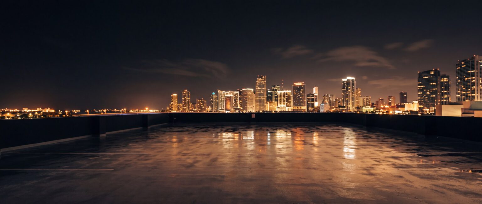 Miami skyline at night from a rooftop