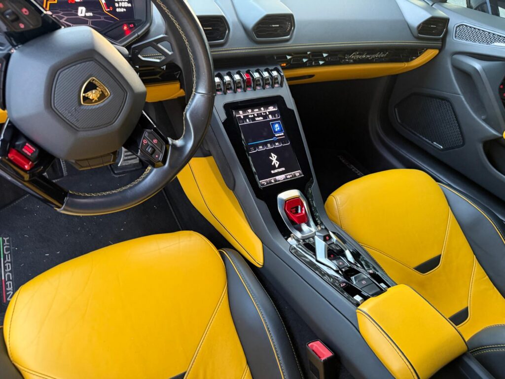 Lamborghini Huracán EVO Spyder dashboard, center console and yellow leather seats