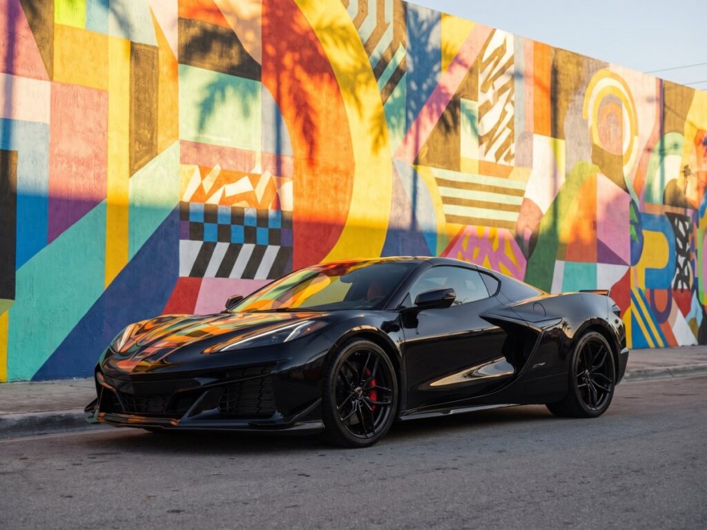 Black Corvette Z06 in front of a Wynwood mural